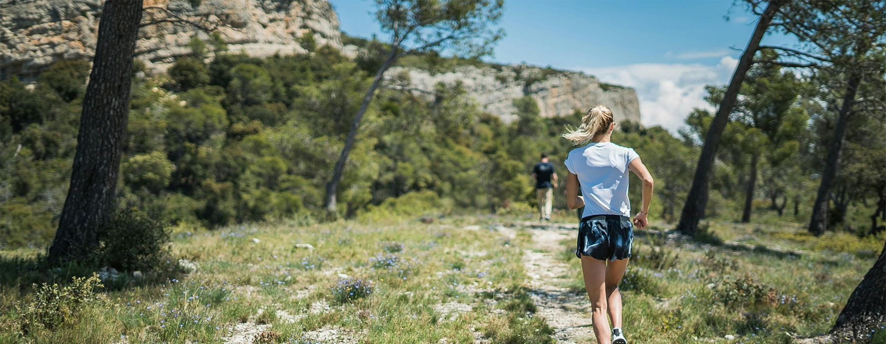 Woman jogging near Tesoro on Spain Apartments 